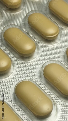 Close-up of pill blisters. Vertical video.