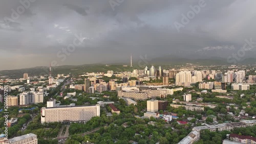 A drone view of the central part of Almaty, Kazakhstan, during sunset on a spring evening.