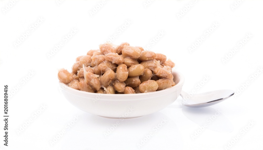 Fototapeta premium Bowl of natto, japanese fermented soybeans, great for asian cuisine menus, food blogs, health articles, and culinary websites.