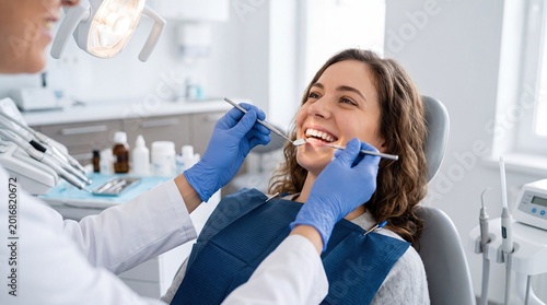 Smiling woman at dentist clinic during professional dental checkup