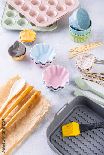 Fotografie Assorted kitchen utensils for air fryer or oven baking