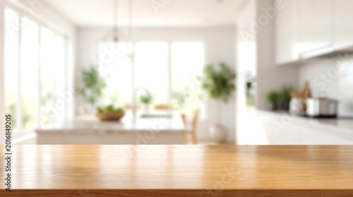Empty wooden table top with blurred bright white kitchen for product display mockup and website banner design