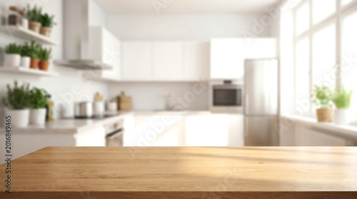 Empty wooden table top with blurred white kitchen background for household product display and website presentation