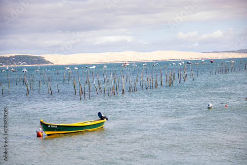 Oyster Farms and Boat Navigation in Arcachon Bay with Dune du Pilat View