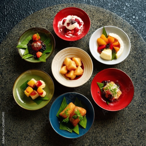 Variety of Colorful Dishes Served in Bowls at a Dining Table in a Restaurant ...