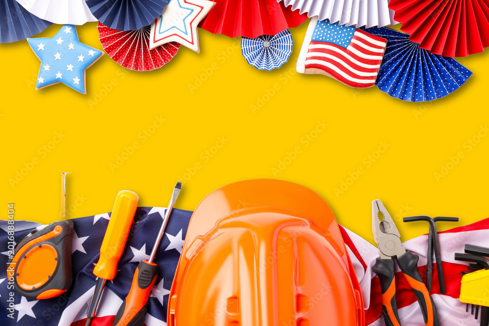 Obraz premium Labor Day celebration featuring tools and festive decor