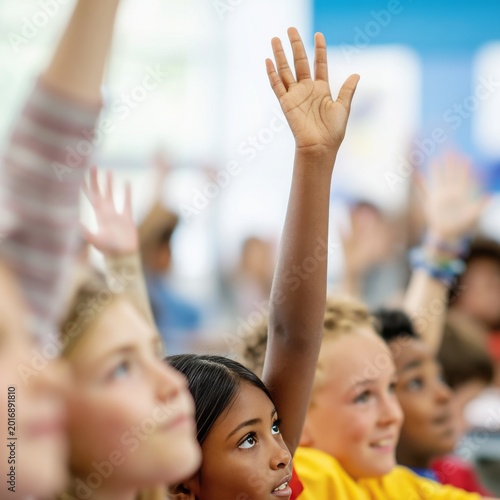 Students Raise Hands in Classroom During Learning Session in the Morning