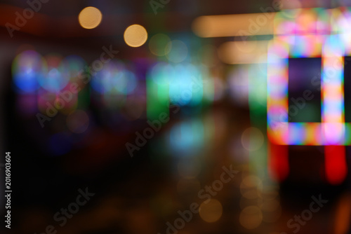 Abstract Blurred Casino Interior with Colorful Neon Lights and Bokeh Background