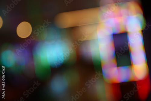 Abstract Blurred Casino Interior with Colorful Neon Lights and Bokeh Background