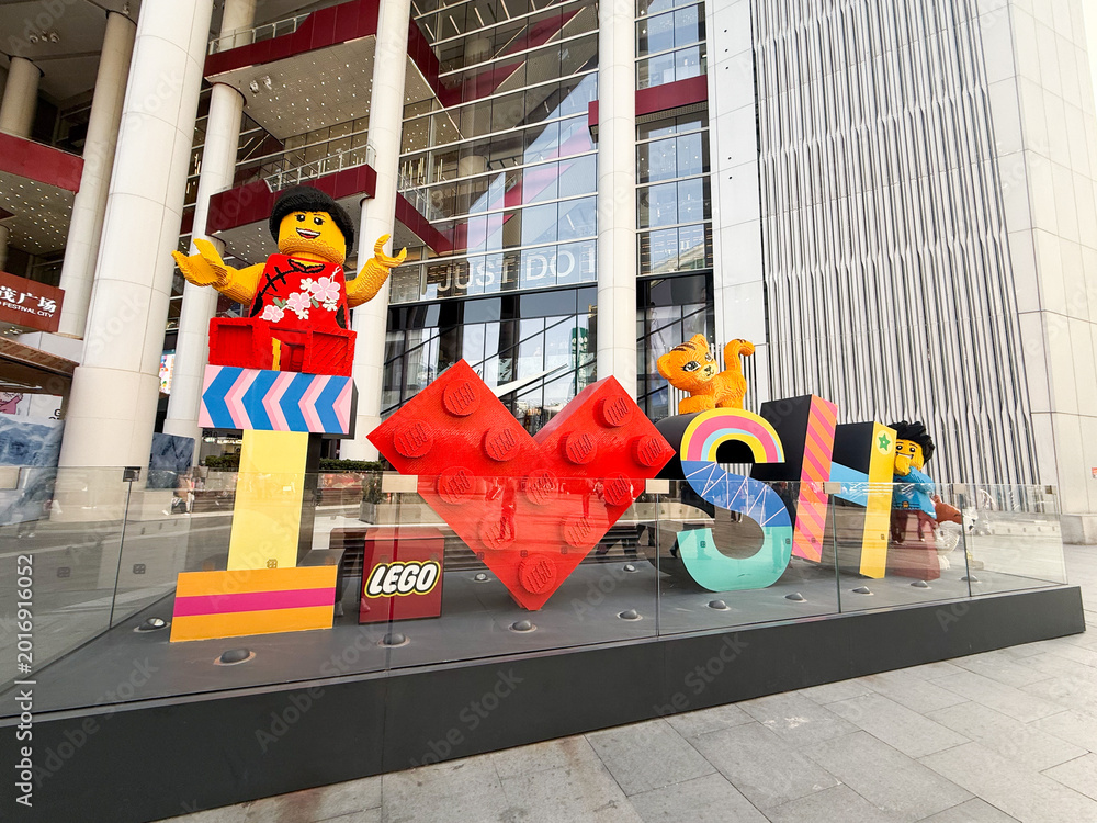Fototapeta premium Shanghai, China - November 27, 2025: LEGO I Love Shanghai Installation in Front of Nike House of Innovation Building