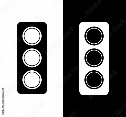 Foto Two contrasting traffic light icons, one black on white and one white on black, illustrating inverse design concepts