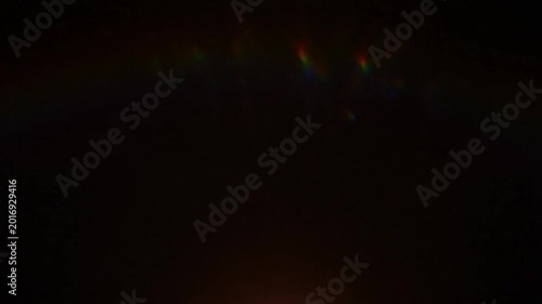 Vibrant Rainbow Prism Light Leak Effect Over Dark Background For Cinematic Video Overlay And Creative Optical Transitions