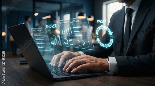 Businessman using laptop with holographic agile project management dashboard. Sprint planning, KPI metrics, task tracking, and digital workflow concept.