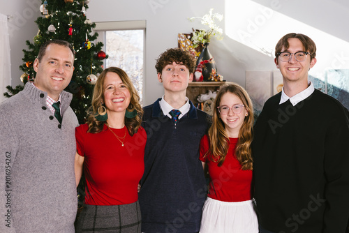 Fotografija Family with teenagers and young adults smiles together at Christmas