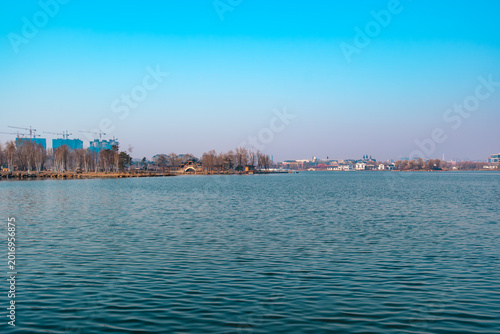 Hailong Lake Scenic Area in Meihekou – Ecological Wetland and Urban Park Landscape with Lakeside Recreation, Commercial Street and Public Leisure Spaces, China – April 2, 2026