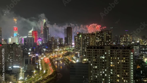 Ho Chi Minh City, Vietnam April 30, 2026 4k video of epic fire work performance to reunification Day of Vietnam at Sai Gon River look from the Gold view apartment, district 4 