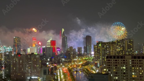 Ho Chi Minh City, Vietnam April 30, 2026 4k video of epic fire work performance to reunification Day of Vietnam at Sai Gon River look from the Gold view apartment, district 4 