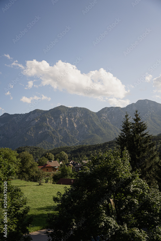 Obraz premium Scenic View of Mountains and Greenery