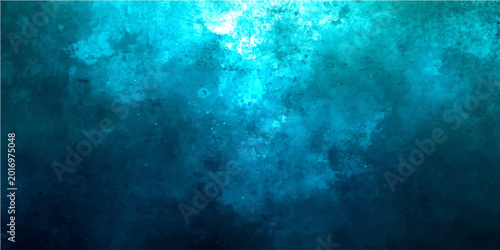 Tableau sur toile Deep blue underwater background with light rays, turquoise ocean water texture v