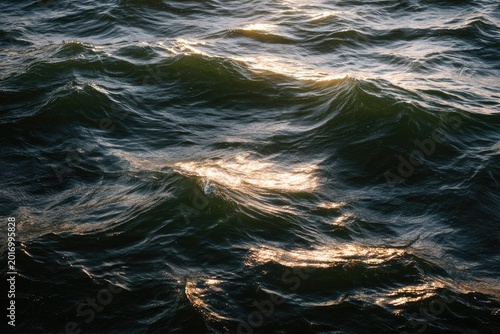 Sunlight Glinting on Dark Ocean Waves