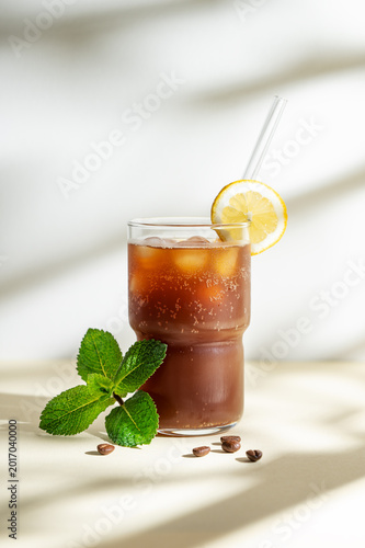 Cold Coffee Tonic Drink With Lemon and Ice