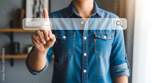 Person's finger pressing a search bar on a digital screen, exploring online information