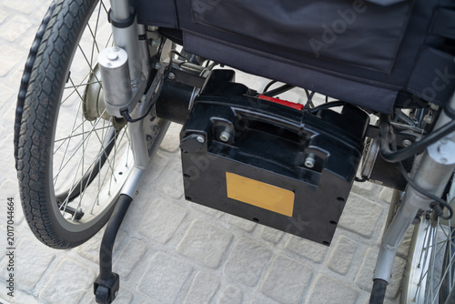 Battery power electric wheelchair increased mobility for disability or elderly patient.