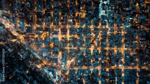 Top Down View of Urban City Grid with Warm Street Lights at Night