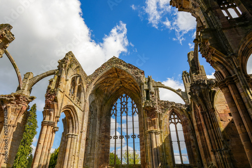 Quadro em tela The ruins of Melrose Abbey, a Cistercian abbey and a prime example of Gothic architecture in Scotland