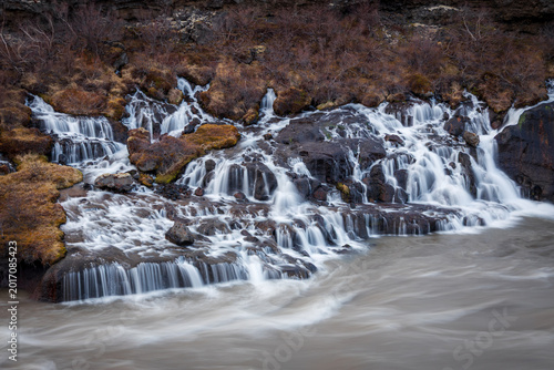 Obraz na plátne Hraunfossar waterfalls in Iceland, also named Lava Falls, and Hvita river