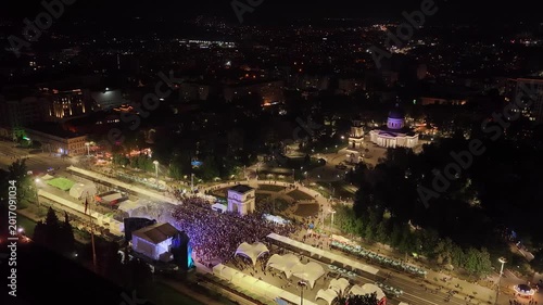 Night aerial panorama of Chisinau city center with Cathedral Park and crowded square