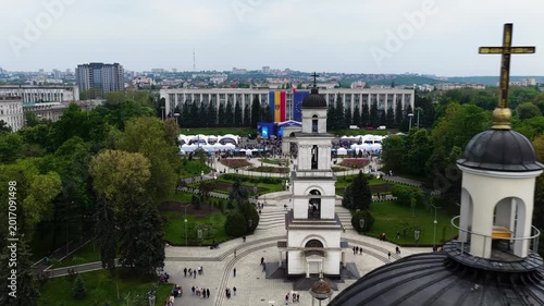Orbit around cathedral cross and cinematic approach to Bell Tower in Chisinau center