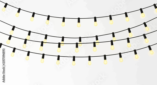 string of fairy lights with yellow bulbs on black cords isolated on white background