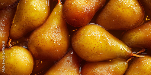 Sweet golden pears in honey syrup glaze close up