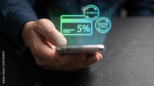 Mobile Banking Rewards and FinTech Concept: Man Using Smartphone with Holographic Credit Card, 5% Cashback Incentive, and Loyalty Reward Points Interface
