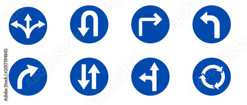Collection of blue circular road signs with white arrows, providing essential directional guidance for various traffic maneuvers and safe navigation on streets and highways
