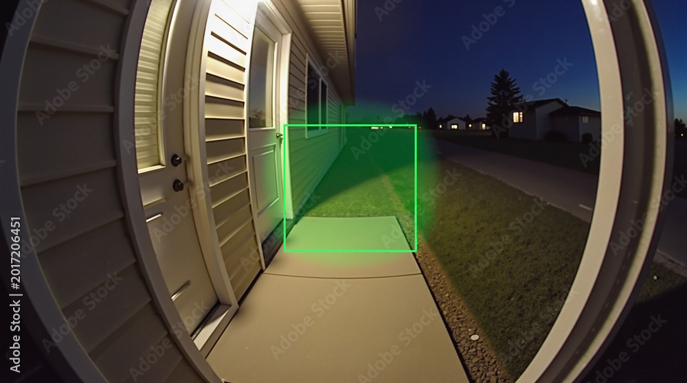 Fototapeta premium Electronic security system monitoring entrance at night with shadow detection 