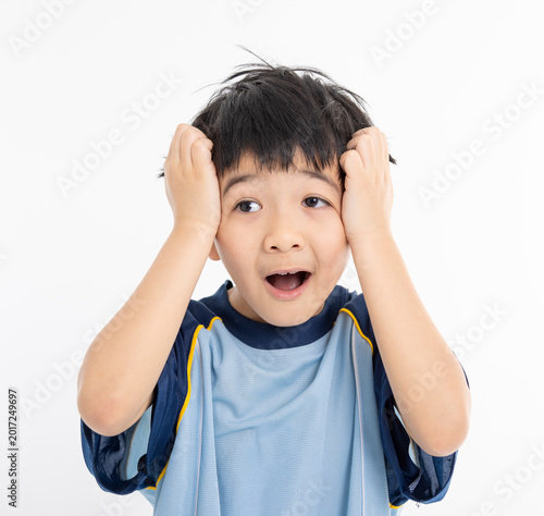 The boy's embarrassed expression