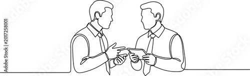 Cuadro en lienzo Two businessmen in shirts and ties, engaged in discussion over a tablet, single
