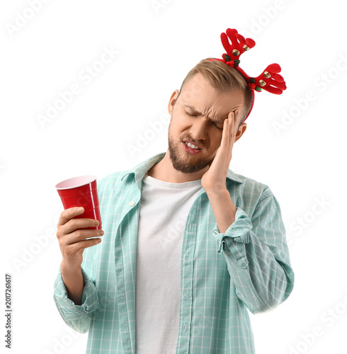 Young man in reindeer horns...
