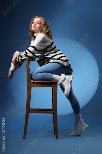 Stylish young woman in wint...
