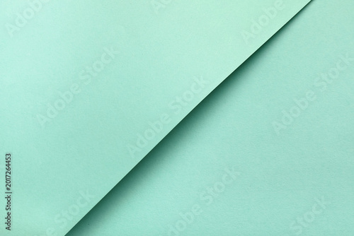 Sheets of turquoise paper a...