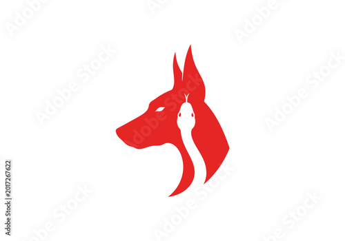 Foto Red dog head silhouette with white snake negative space