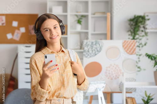 Teenage girl in headphones ...