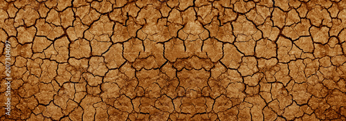Bild auf Leinwand Top aerial view of texture pattern cracked brown dried land soil ground texture background