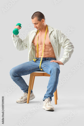 Male bodybuilder with tape ...