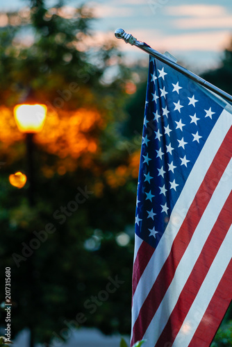 American flag hangs in suburban America