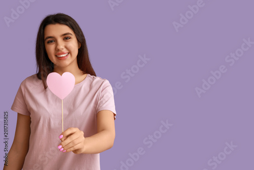 Happy young girl with pink ...