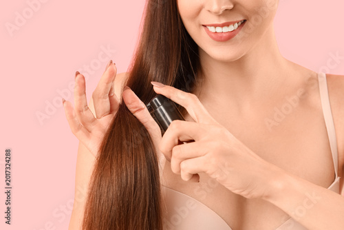 Young brunette woman with h...