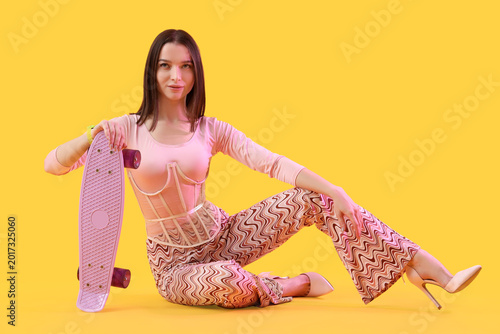 Stylish young woman with sk...